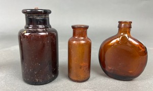 lot 384 image: Antique Amber Glass Bottles- 10 Pieces #1
