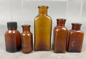 lot 386 image: Antique Amber Glass Bottles 10 Pieces #3