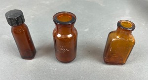 lot 388 image: Antique Amber Glass Bottles 10 Pieces #5