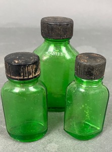 lot 383 image: Collection of Antique Green Glass Bottles with Black Screw Caps