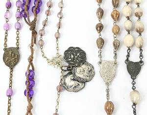 lot 312 image: Ten Assorted Vintage Rosaries in Natural and Violet Tones - 14 Inches to 21 Inches
