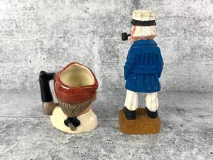 lot 263 image: Vintage Mini Royal Doulton Toby Mug and Carved Wood Folk Art Sea Captain Figure