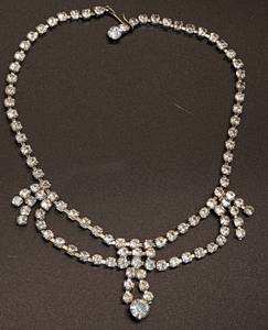 lot 420 image: Vintage Rhinestone Jewelry Pin, Draped Necklace, and Bracelet