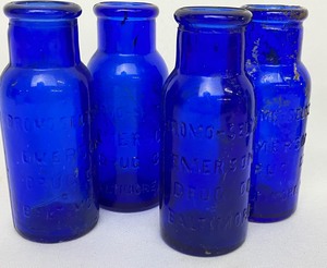 lot 427 image: 10 Antique Cobalt Blue Bottles with Advertising - #2