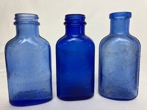 lot 426 image: 10 Antique Cobalt Blue Bottles with Advertising -#1