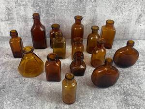 lot 508 image: 15 Beautiful Vintage Glass Bottles in Shades of Amber