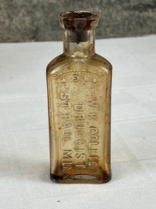 lot 535 image: Collection of Vintage Light Amber Glass Bottles- W.K. Collier Druggist & more