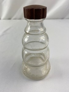lot 546 image: 10 Antique Glass Bottles w Advertising- Old Monk, Husbands, Roches, Sloans, Hinkleys & more