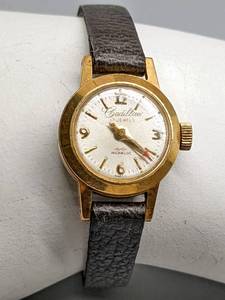 lot 557 image: THREE Stylish Vintage Watches - Wind-Up Cadillac Incabloc, and Electric Jules Jurgensen and Two-Tone