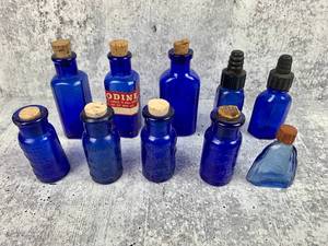 lot 466 image: An Array of Vintage Cobalt Blue Glass Bottles with Lids