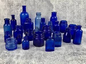lot 467 image: A Lot of 26 Vintage Cobalt Blue Glass Bottles