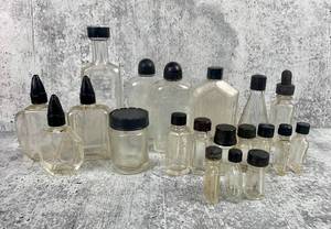 lot 485 image: 20 Vintage Clear Glass Bottles with Black Caps