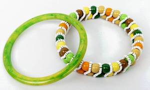 lot 279 image: Vintage BAKELITE Bracelets, Pin and Dress Clip, Plus Two 60s Glitter Bangles