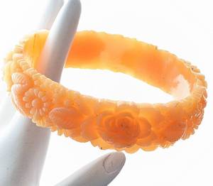 lot 271 image: Vintage Carved Floral Tangerine BAKELITE Bangle Bracelet