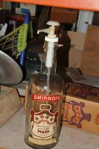 lot 27 image: Smirnoff Vodka Glass Bottle Dispenser
