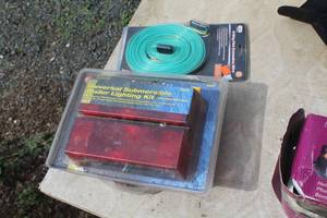 lot 193 image: Universal Submersible Trailer Lighting Kit (in original packaging) w 4-way Flat Extension Wire