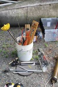 lot 204 image: Lot of (1 Bucket) Ice Fishing Poles and Accessories