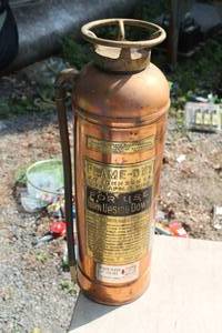 lot 216 image: Vintage J.N. Johnson Flame-out Fire Extinguisher