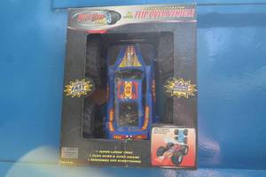 lot 259 image: Road Gear Pro #59 2 Sided Battery Operated Flip Over Vehicle (in original box)