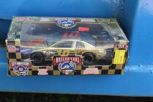 lot 274 image: Racing Champions 50th Anniversary 1 of 1998 #10 Duralube Diecast Metal Stock Car Replica 124 Scale (in original packaging)