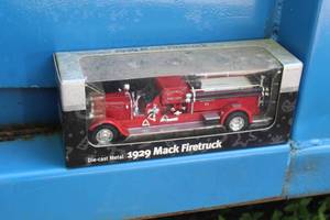 lot 280 image: 1929 Mack Diecast Metal Firetruck Replica (in original packaging)