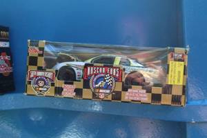 lot 284 image: Racing Champions 1 of 1988 #8 Circuit City Diecast Metal Stock Car Replica 124 Scale (in original packaging)
