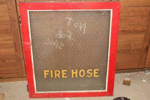 lot 387 image: Vintage Fire Hose Door