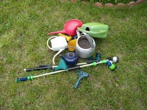 lot 57 image: Watering Cans & Hose Attatchments