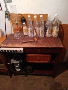 lot 268 image: Table with Lamp Oil & Oil Lamp