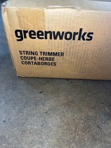 lot 30 image: Greenworks electric string trimmer