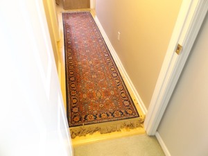 lot 77 image: Hand Knotted 2.6 x 12 Wool Persian Rug Runner