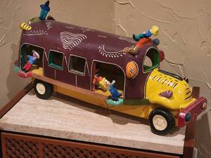 lot 67 image: Adorable Mexican Clay Bus Sculpture