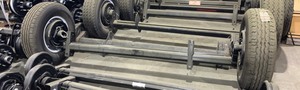 lot 606 image: Axle With Tires