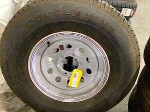 lot 516 image: Tire With Rim