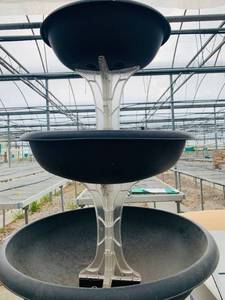 lot 21 image: Two Garden Fountain-style Planters for Floral Display
