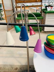 lot 71 image: Table with wheels, Plastic snack bowls, Colorful floor lamp