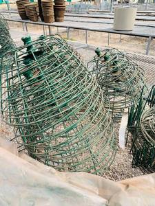 lot 83 image: Wire plant basket with metal post