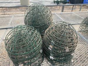 lot 76 image: Green Rubber Coated Hanging Plant Holders