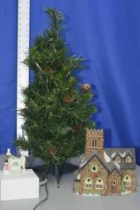 lot 153 image: Dept. 56 figurine with christmas tree