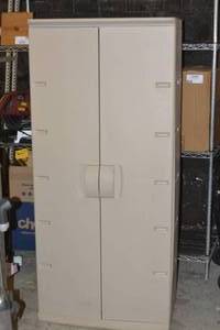 lot 23 image: Rubbermaid Storage closet