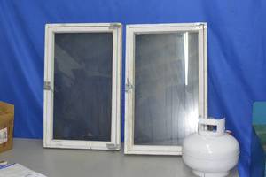lot 68 image: small propane tank and casement windows