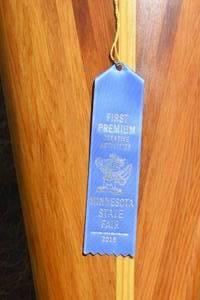 lot 1 image: Beautiful 17 Handmade hand carved wooden Kayak. Won First Place at the MN State Fair