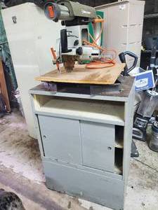 lot 22 image: Black and Decker Compact Radial Saw and pedestal
