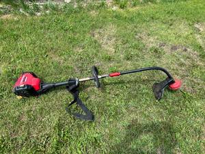 lot 48 image: Troy-Bilt Jump Start Weed Trimmer
