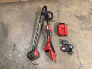 Toro 60V Max Lithium-Ion Brushless Cordless 15 in.  13 in. String Trimmer - 2.0 Ah Battery and Charger Included - Open Box - Review all pictures