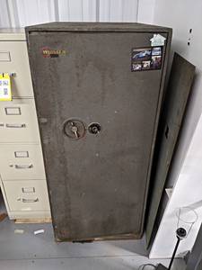 lot 895 image: Vintage MOSLER File Cabinet Safe - includes Combination - Overall about 54 x 33 x 24 - Heavy - Located on Mezzanine - NO SHIPPING