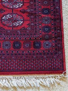 lot 64 image: Vibrant Red Wool Area Rug