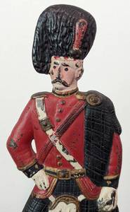 lot 66 image: Painted Cast Iron Bonnie Scotland Doorstop
