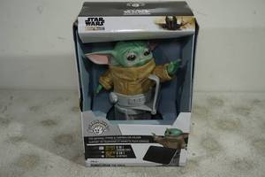 lot 95 image: Star Wars Madalorian The Child Phone and Controller Holder
