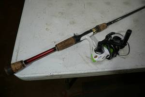 lot 103 image: Temple Fork Outfitters Fishing Rod with Lews Spinning Reel